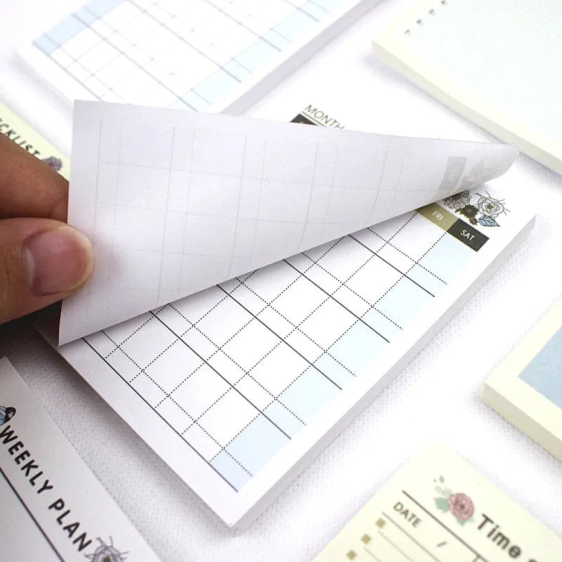 Weekly monthly work plan diary showing four design options in 10.2x7.2cm compact paper planner format