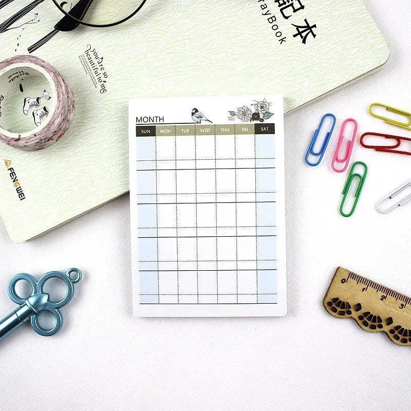 Weekly monthly work plan diary showing four design options in 10.2x7.2cm compact paper planner format