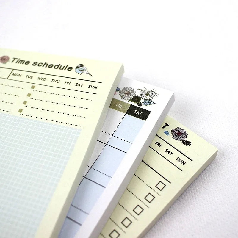 Weekly monthly work plan diary showing four design options in 10.2x7.2cm compact paper planner format