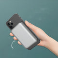 Silver aluminium wireless magnetic charging power bank for iPhone showing USB-C port.