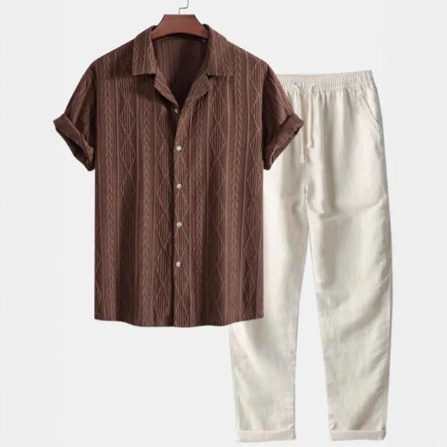 Slim-fit linen-polyester casual suit with camouflage print, showing short-sleeved cardigan shirt and matching trousers.