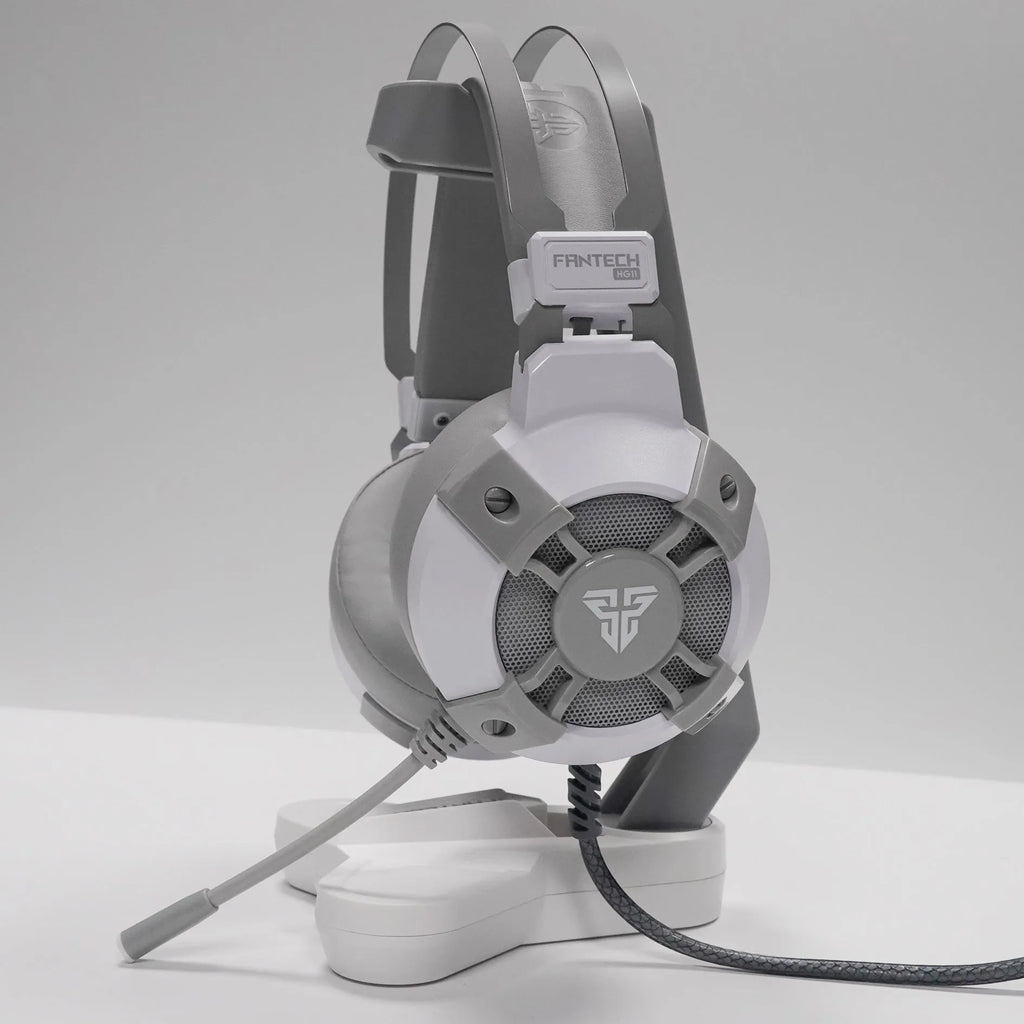 Black FANTECH HG11 USB gaming headset with RGB lights on earcups and a noise reduction microphone.