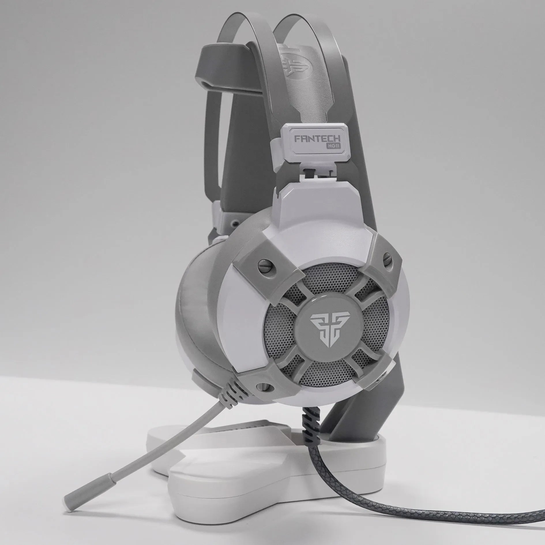 Black FANTECH HG11 USB gaming headset with RGB lights on earcups and a noise reduction microphone.