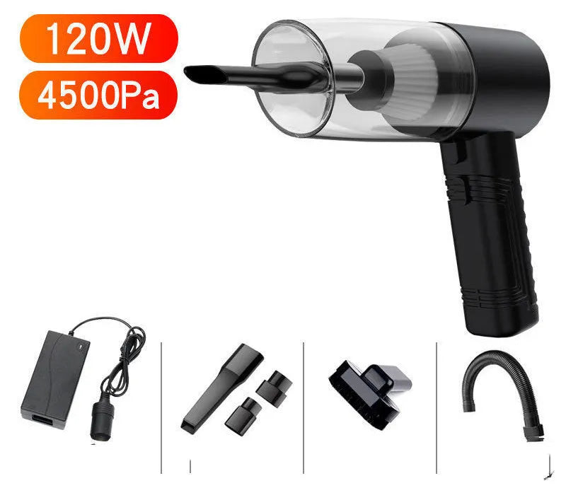 Black and white mini car vacuum cleaner with long cable and suction head accessories on a table.