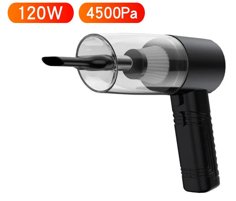 Black and white mini car vacuum cleaner with long cable and suction head accessories on a table.