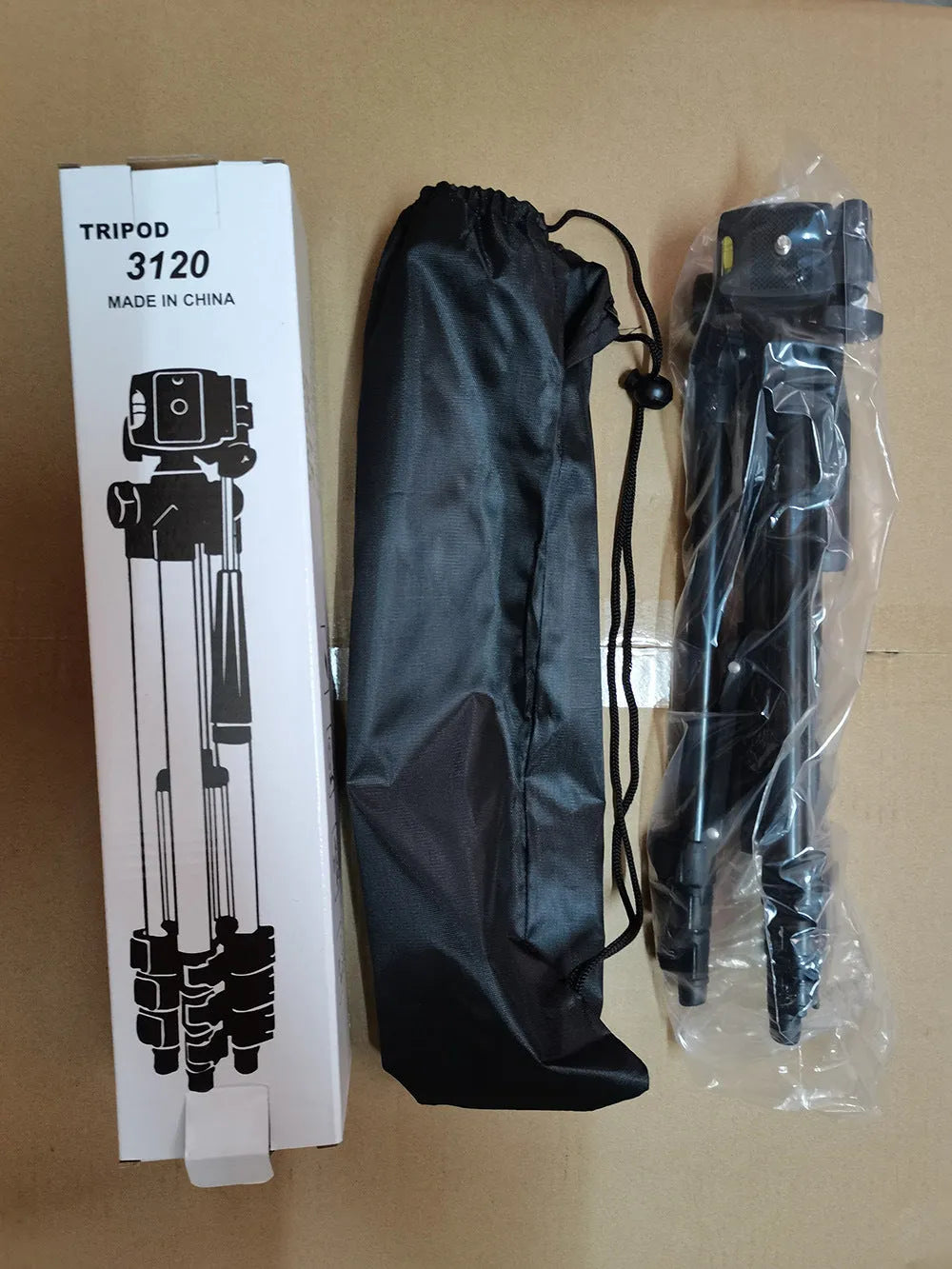 Black aluminium portable camera tripod with 4-section legs and a 3D head, shown extended.
