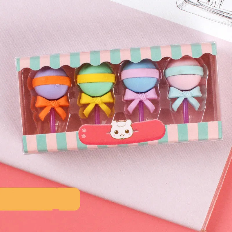 Set of 12 cartoon-shaped erasers including cones, ice creams, donuts, and lollipops for children.