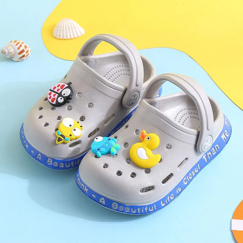 Yellow PVC kids slippers with cartoon animal pattern and porous holes
