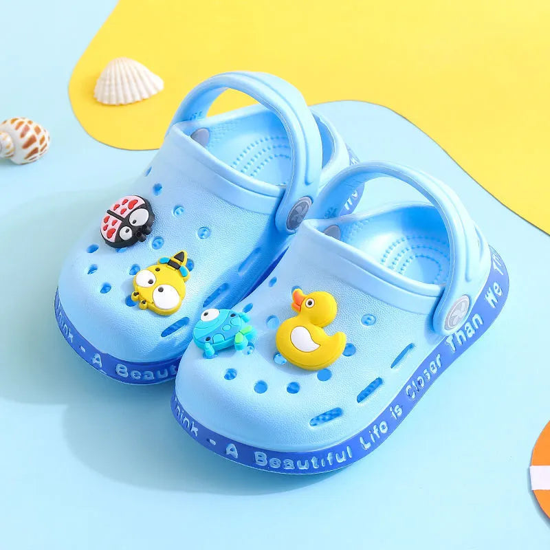 Yellow PVC kids slippers with cartoon animal pattern and porous holes