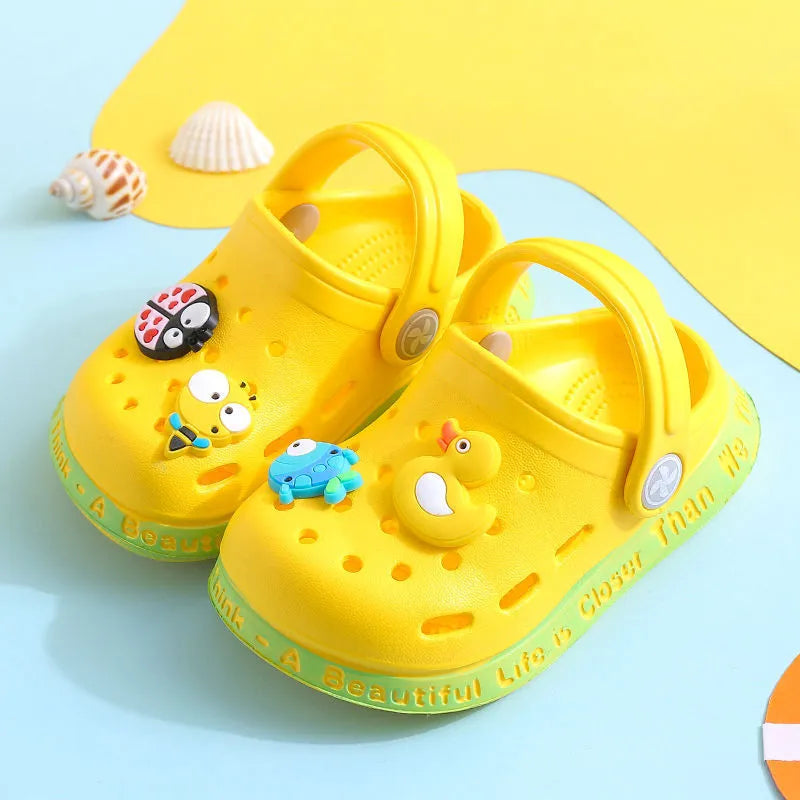 Yellow PVC kids slippers with cartoon animal pattern and porous holes