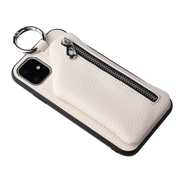 Pink imitation leather crossbody phone case with attached lanyard and zipped coin purse.