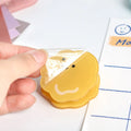 Colourful acrylic clip with cartoon collage design for scrapbooking and photo displays.