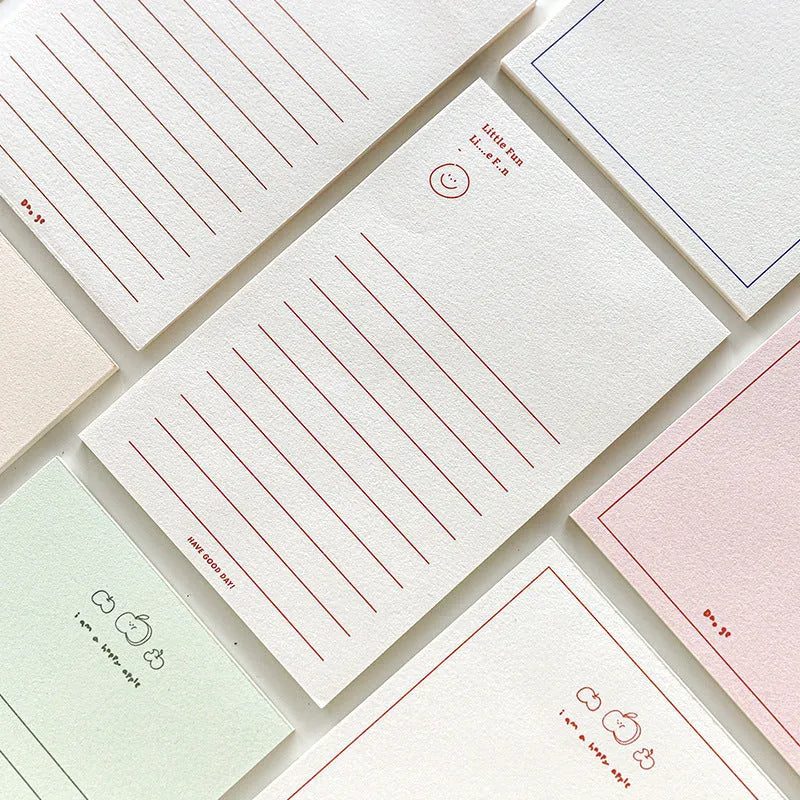 Apple-compatible memo pad notebook with colourful cover designs showing blank and lined paper options