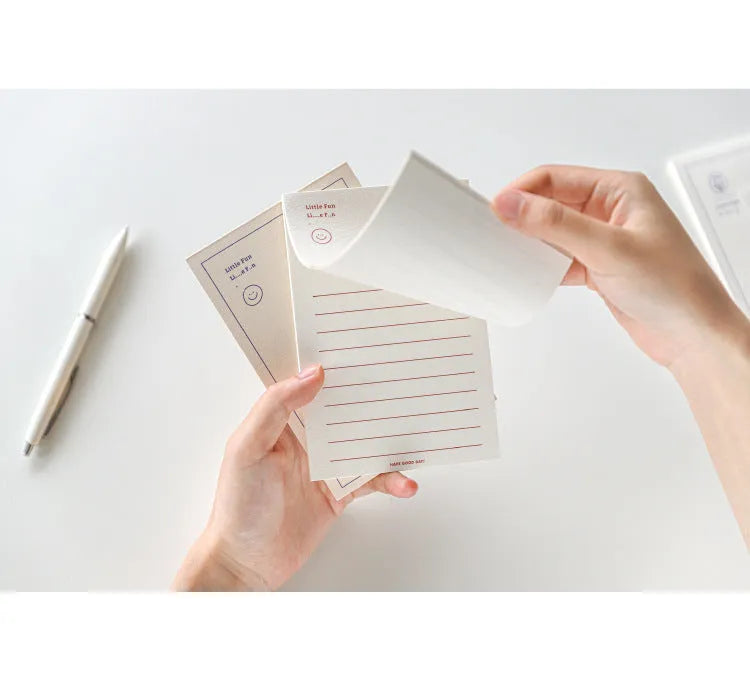 Apple-compatible memo pad notebook with colourful cover designs showing blank and lined paper options
