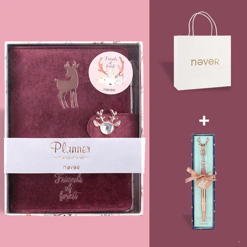 A6 loose-leaf notebook with a textured cloth cover, shown in a blue velvet colour variant, open to reveal binder rings.
