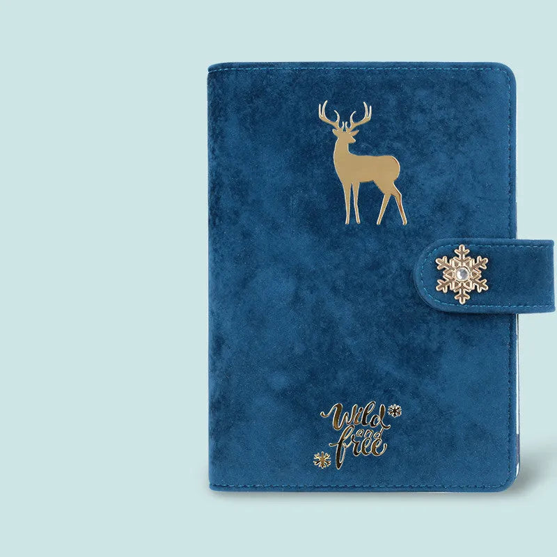 A6 loose-leaf notebook with a textured cloth cover, shown in a blue velvet colour variant, open to reveal binder rings.