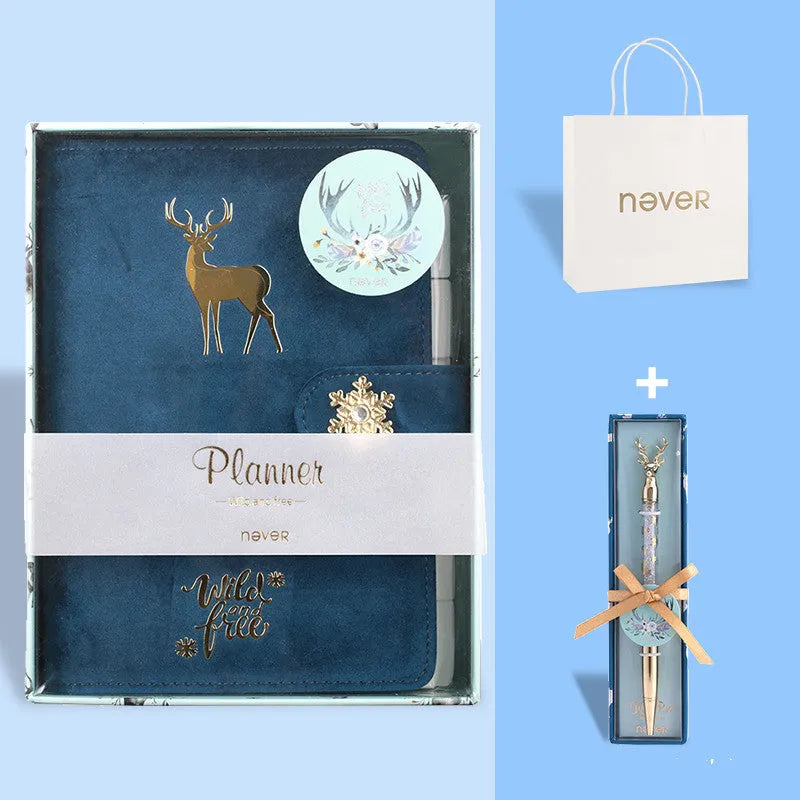 A6 loose-leaf notebook with a textured cloth cover, shown in a blue velvet colour variant, open to reveal binder rings.