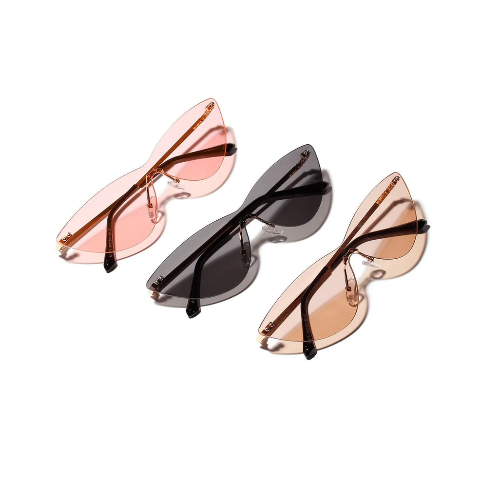 Brown tinted vintage sunglasses with a metal frame for adults