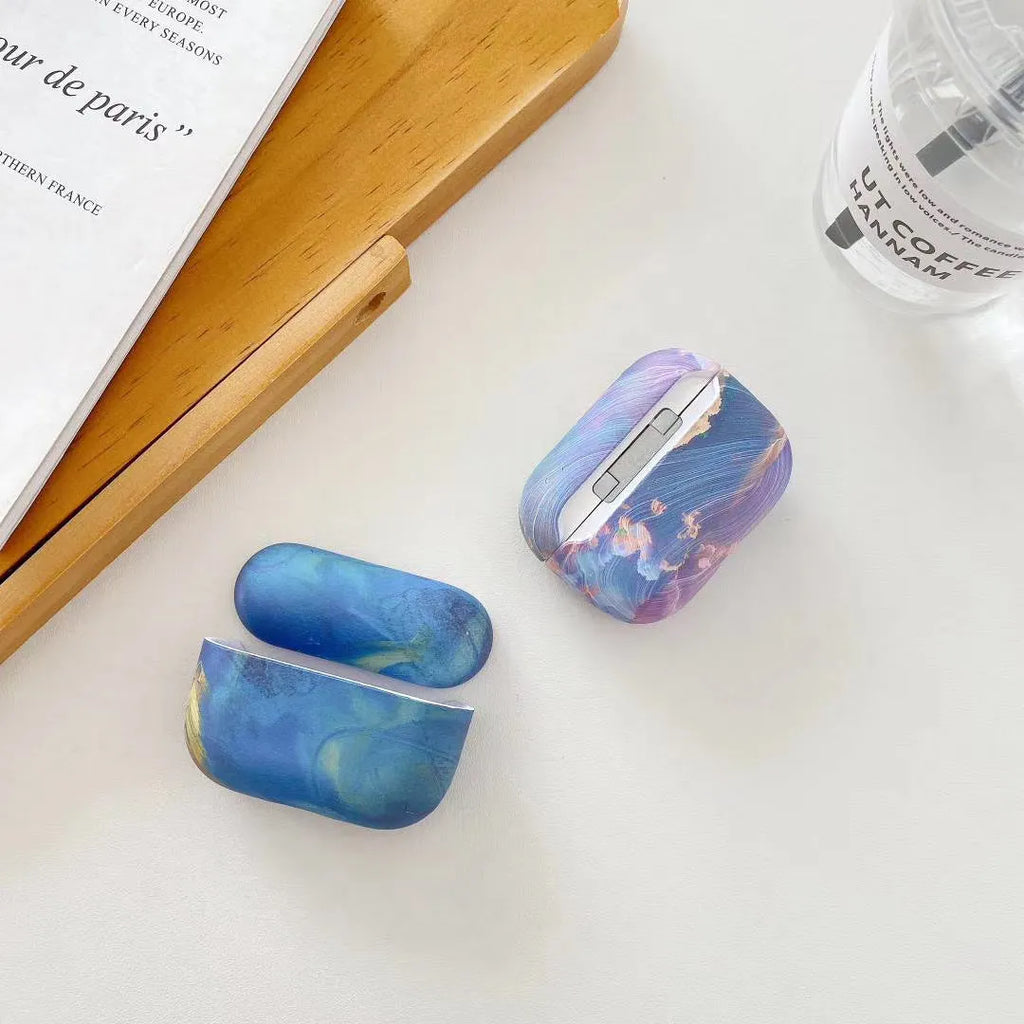 Pink and blue watercolour pattern hard plastic protective sleeve for Apple AirPods Pro and AirPods 1/2 cases.