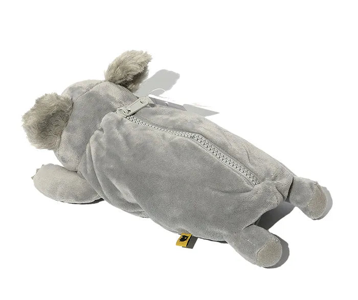 Brown plush pencil case with cartoon wombat design and a silver zipper, open to show interior.