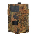 Orchard surveillance camera with compact black casing and lens for outdoor farm security monitoring