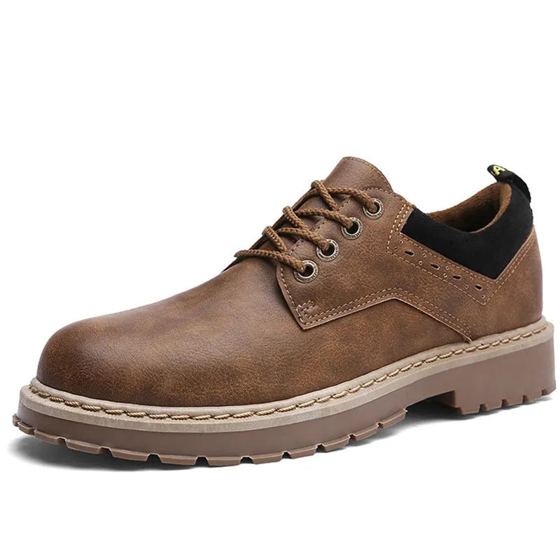 Men's black casual tooling shoes with a round toe and lace-up front on a rubber sole.