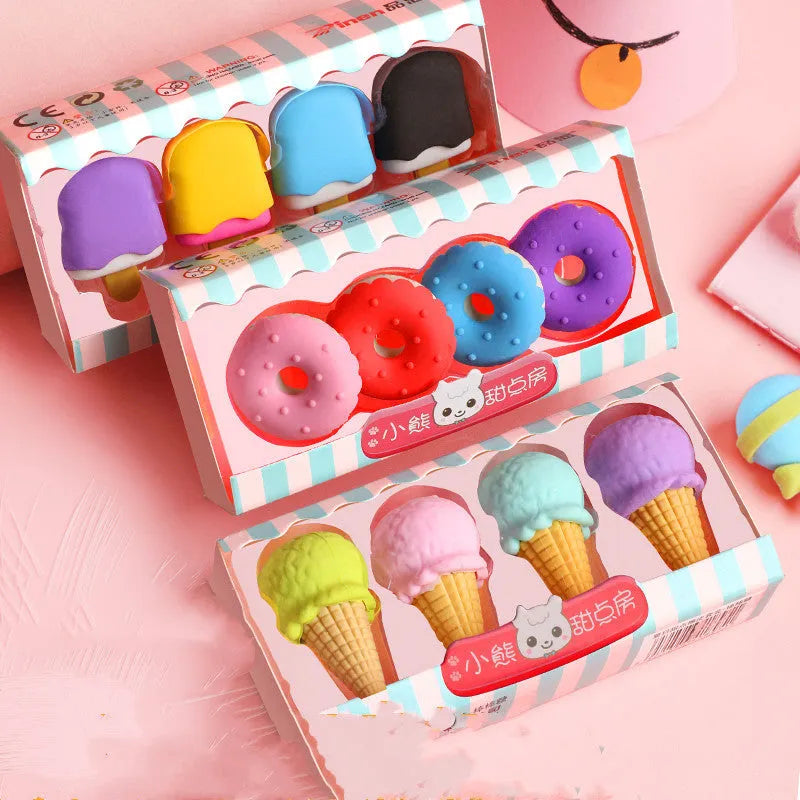 Set of 12 cartoon-shaped erasers including cones, ice creams, donuts, and lollipops for children.