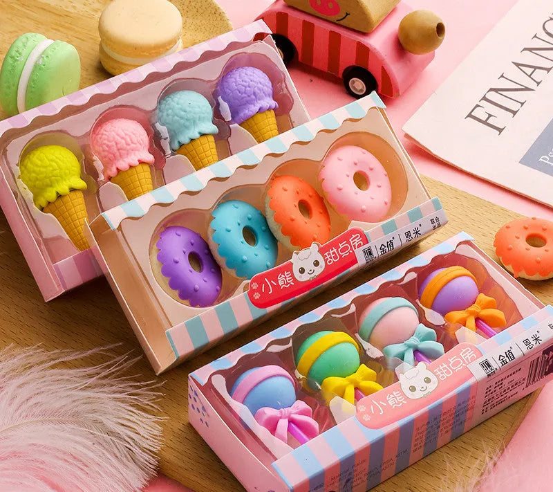 Set of 12 cartoon-shaped erasers including cones, ice creams, donuts, and lollipops for children.