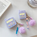 Purple silicone clamshell case for Apple AirPods with a small white fur ball pendant attached.