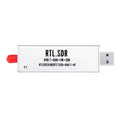 Black metal all-band software-defined radio SDR receiver with gold SMA connector for aviation and general radio scanning.