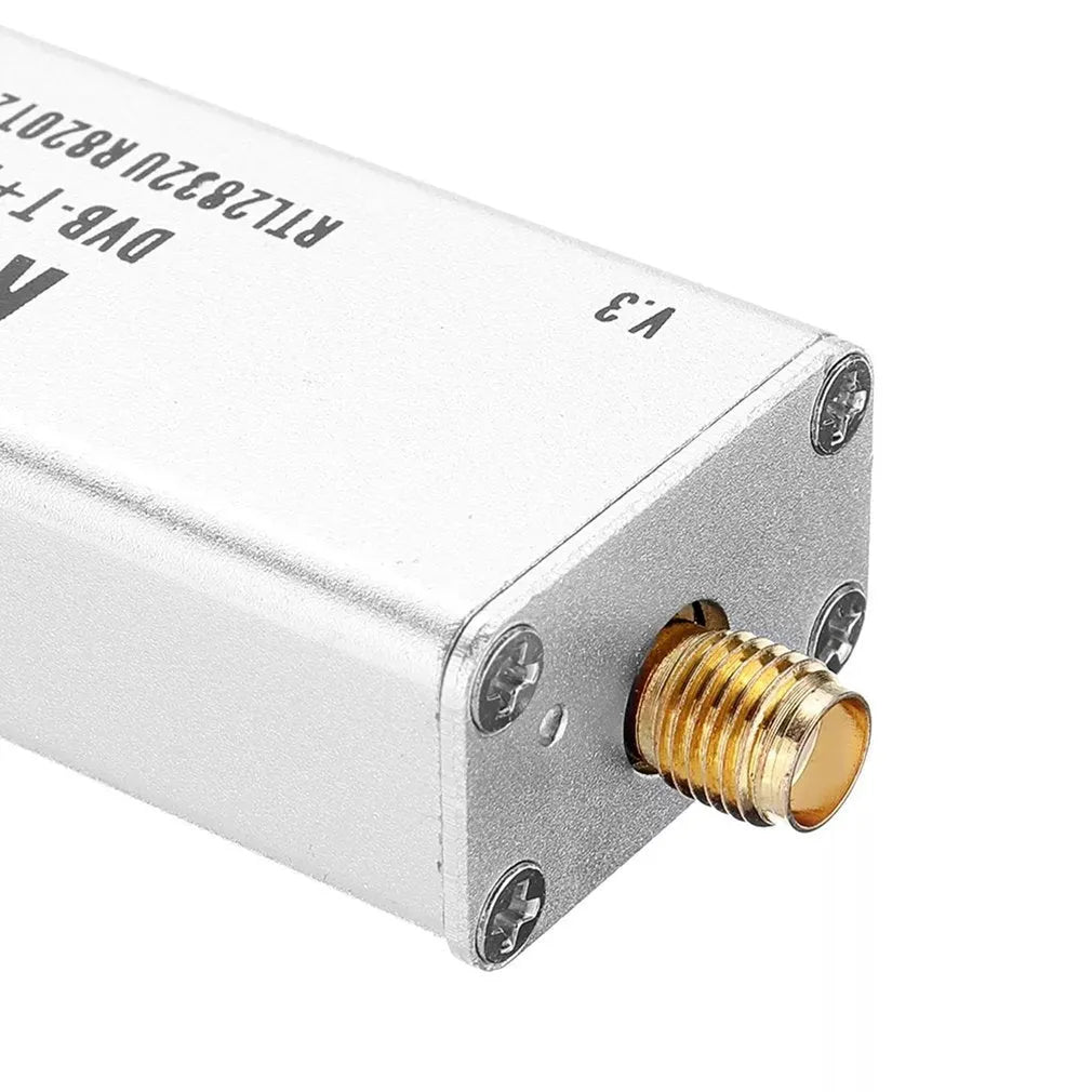 Black metal all-band software-defined radio SDR receiver with gold SMA connector for aviation and general radio scanning.