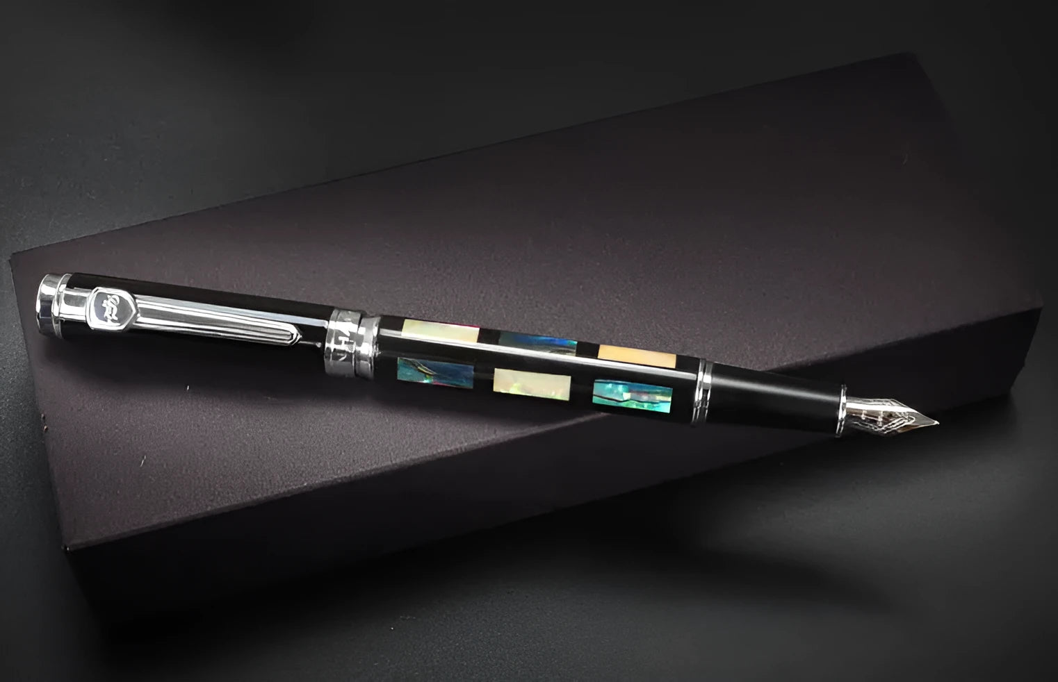 Ceramic colour lacquer pen with rotating ink system and interchangeable nib options in metal body