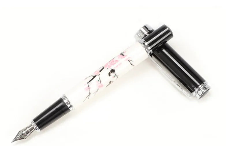 Ceramic colour lacquer pen with rotating ink system and interchangeable nib options in metal body