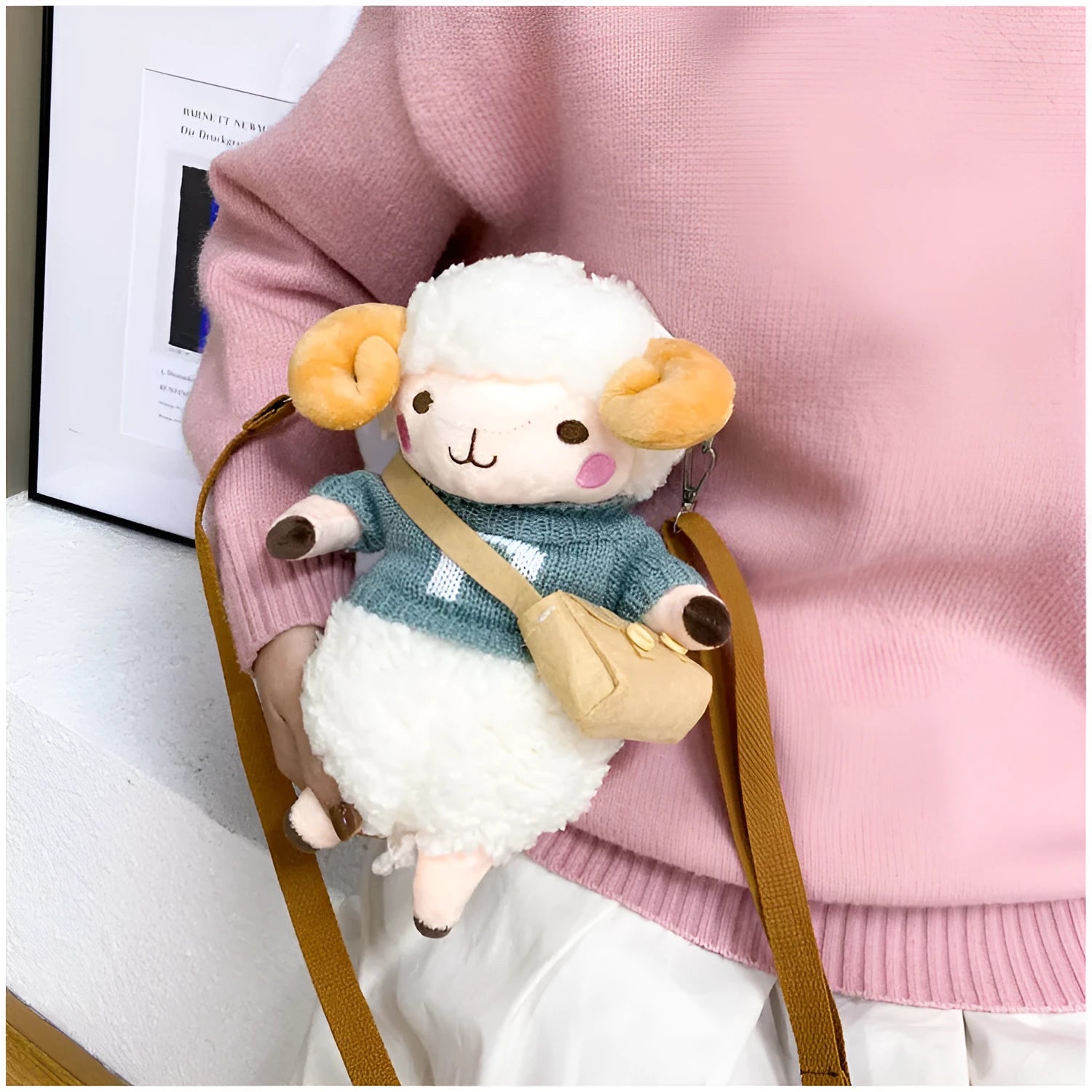 Small square plush crossbody bag with lamb pattern in blue colour showing zipper opening