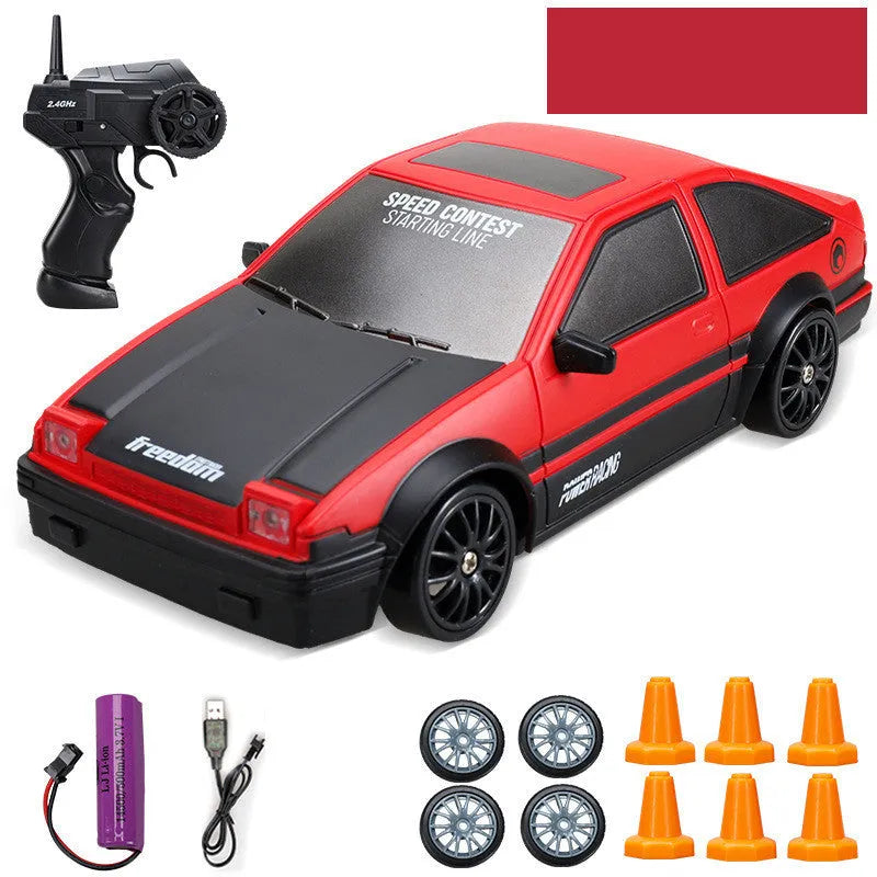 Huangbo red 4WD remote control drift car with wireless controller on a racing track