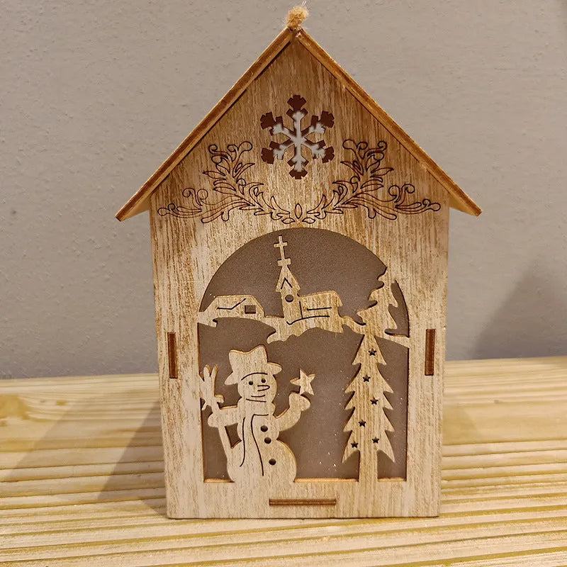 Three wooden Christmas house decorations: snowman, Santa Claus and bell designs in natural wood finish