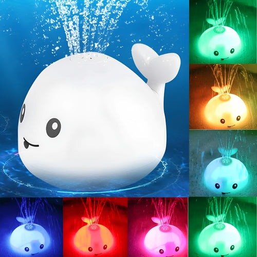 Grey or white cartoon whale bath toy that sprays water with LED lights and music