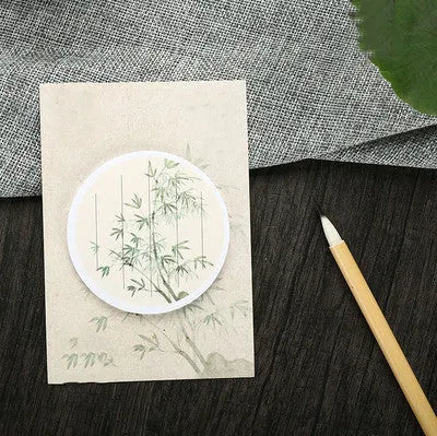 A pad of sticky notes with eight different illustrated leaf designs, including Water Lily and Maple Leaf motifs.