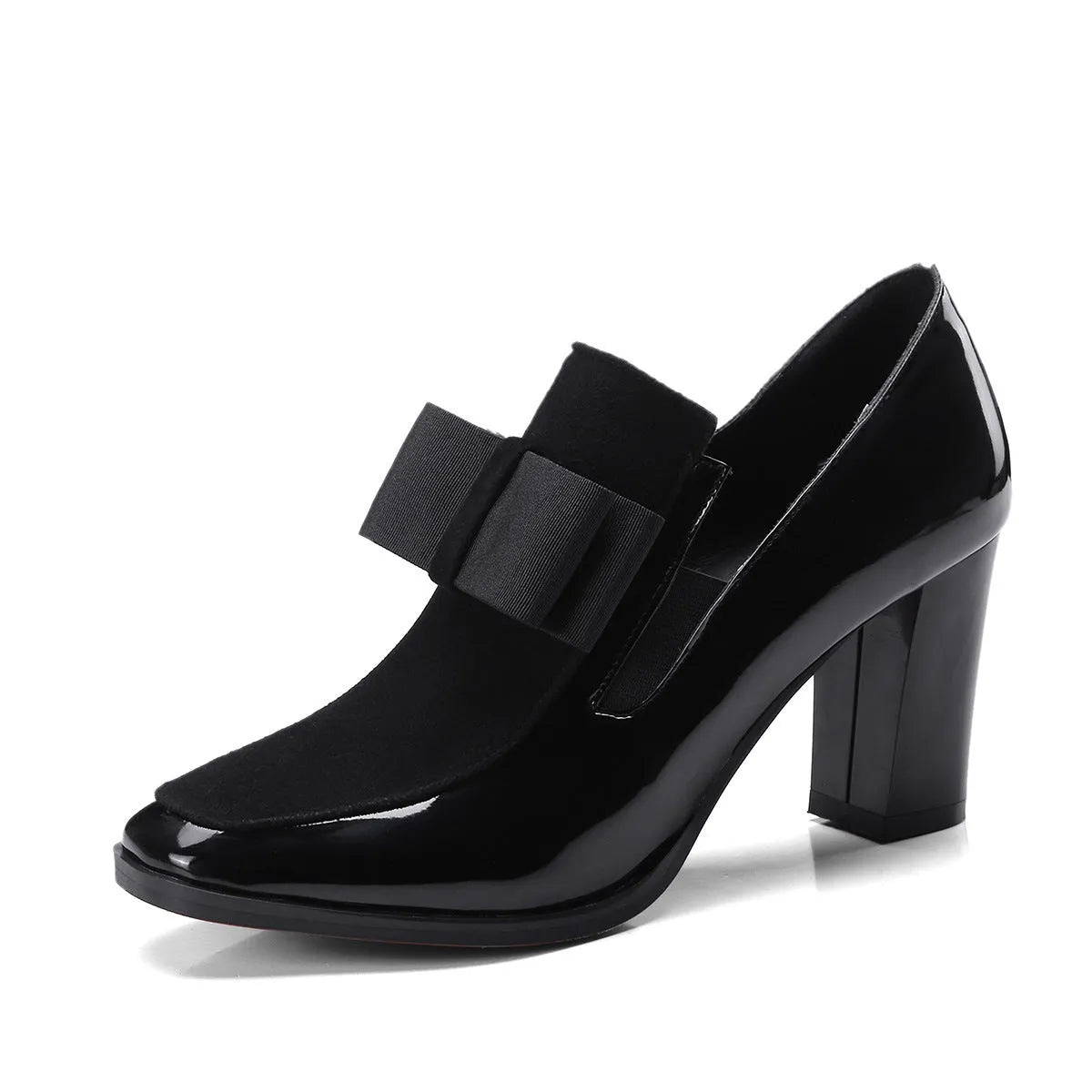 Women's black patent leather high-heel shoes with a thick heel and square toe.