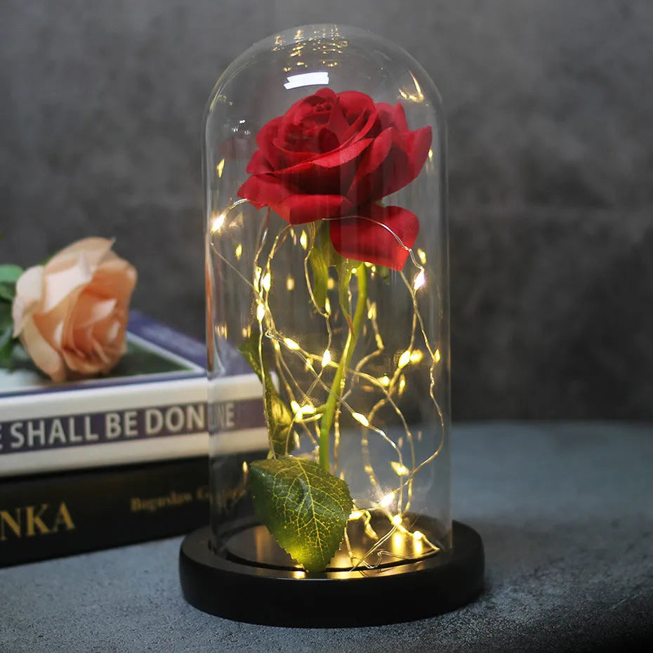 Silk flower LED rose bouquet in glass cover with warm white lighting