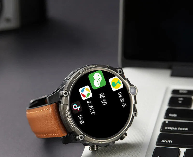 Black 4G smartwatch with 1.6-inch screen, dual cameras, and a wrist strap displayed on an adult wrist.