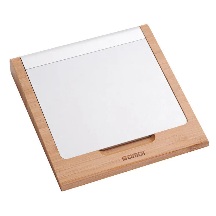 Apple Bluetooth touchpad bracket in natural bamboo wood showing dimensions and tablet compatibility