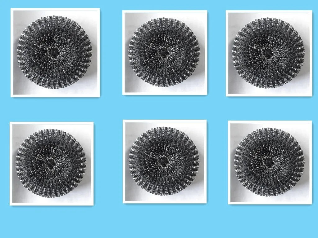 Kitchen palm brush with integrated push-type soap dispenser and bristles for scrubbing.