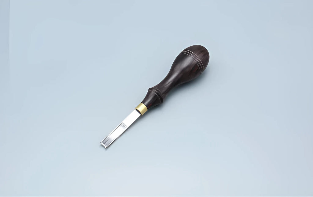 Leather working wide shovel edge thinning knife, a manual hand tool for skiving.