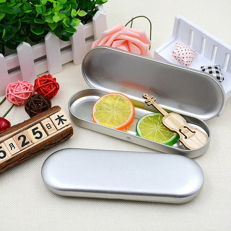 Rectangular frosted iron tinplate box for cosmetic and pen storage, 175mm long.