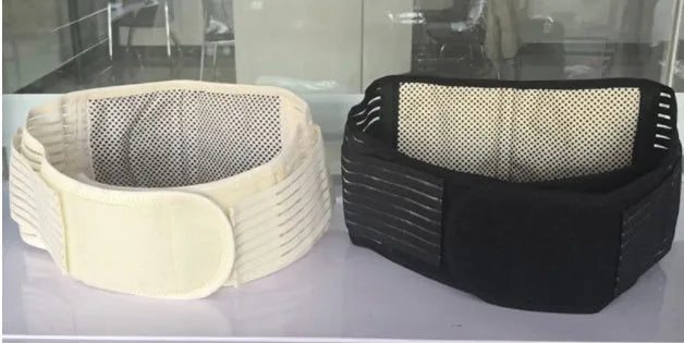 Black self-heating magnetic waist support belt for lumbar muscle strain on a white background.