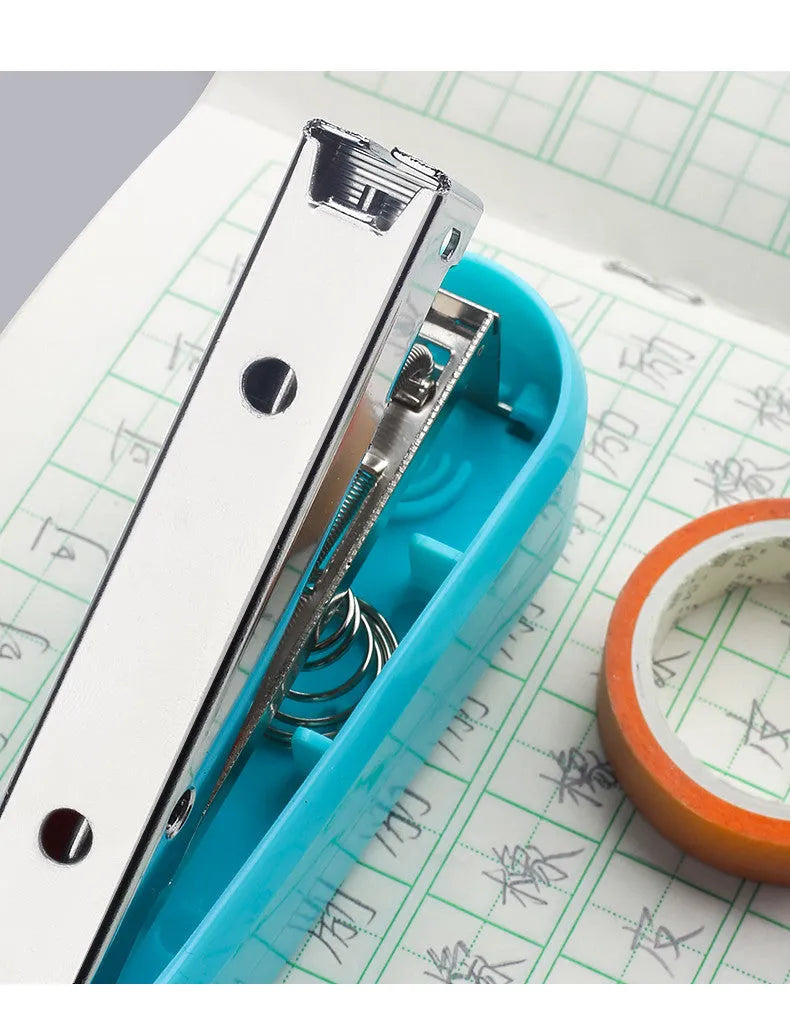360-degree rotatable desk stapler in multiple colours showing metal nail outlet and centre binding function.