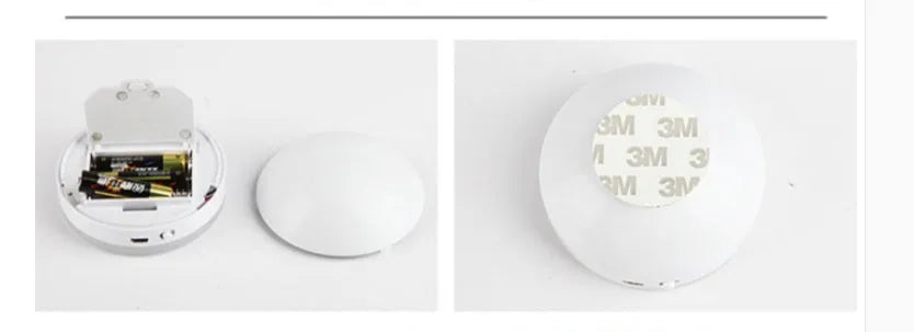 Two compact wireless motion sensor LED lights with adhesive backing, one illuminated with warm white light.
