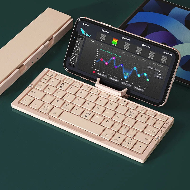 Aluminium foldable Bluetooth keyboard open with phone propped on stand and closed for pocket storage