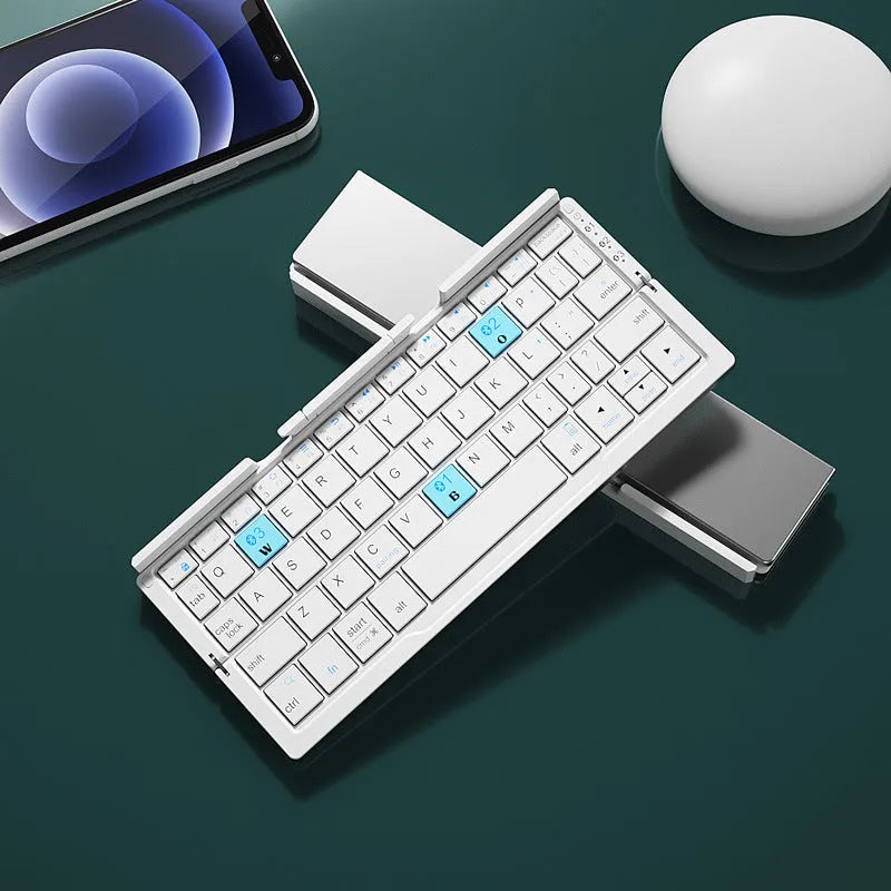 Aluminium foldable Bluetooth keyboard open with phone propped on stand and closed for pocket storage